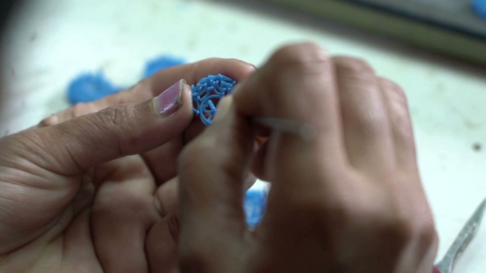 Artisan hand-finishing a gold ring at the DVNJEWELRY Mumbai atelier